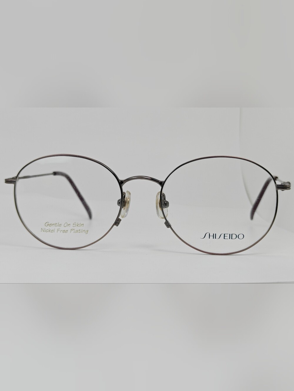 Shiseido 705. Women's Round Metal Glasses in Purple Gunmetal. Systech.